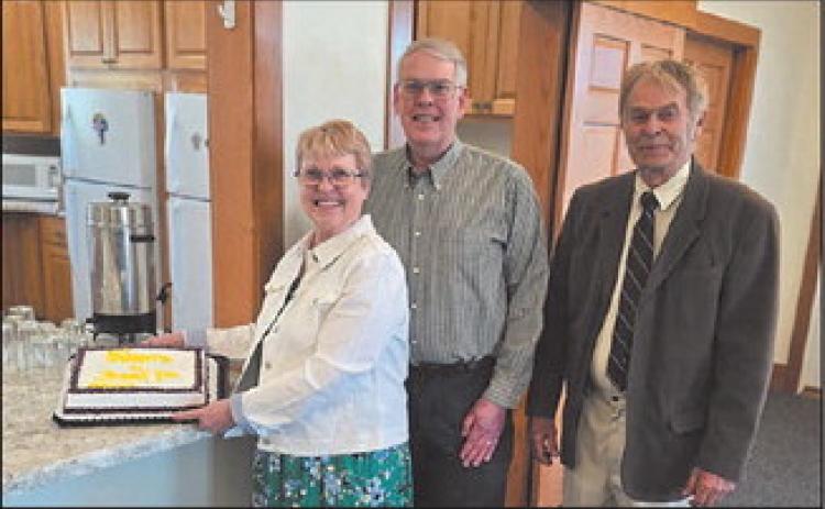 Kris Heine, Steve Vining, and Roger Anderson, current parish president. Submitted photo.