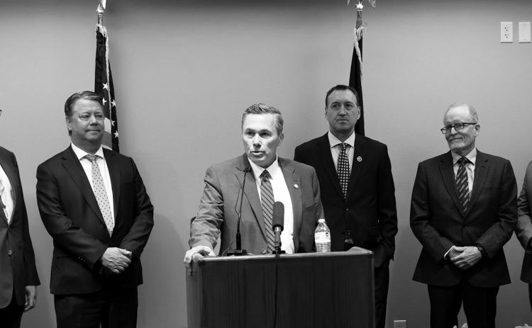 Senate Majority Leader David Hogue, R-Minot, announces a new interim Artificial Intelligence and Data Center Committee at the Capitol on June 25, 2026. Also pictured are, from left, Rep. Todd Porter, R-Mandan, Rep. Mike Nathe, R-Bismarck, Rep. Jonathan Warrey, R-Casselton, former North Dakota University System Chancellor Mark Haggerott, and Sen. Mike Wobbema, R-Valley City. (Photo by Michael Achterling/North Dakota Monitor)