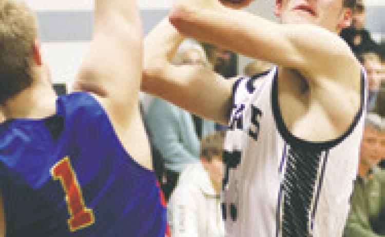 Everett Fedje tries to shoot through the Benson County defense. Photo by Lyle Van Camp.