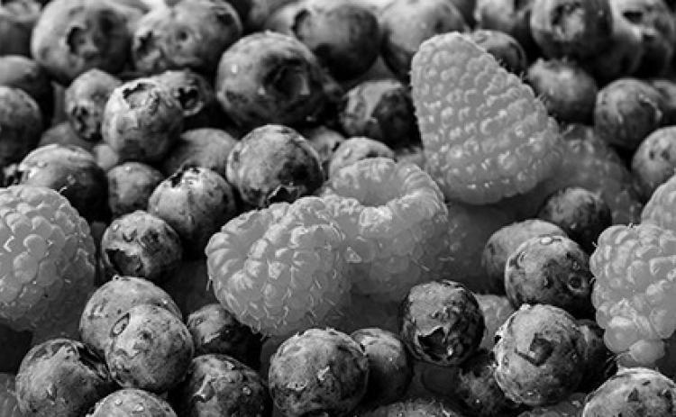 Raspberries and blueberries get their vibrant color from anthocyanin pigments, which may provide heart health benefits and reduce cancer risk. Pixabay photo