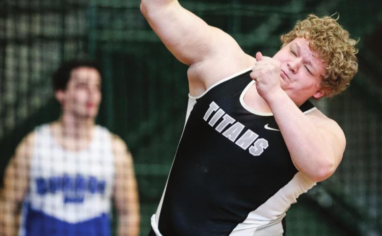 Bryce Wimpfheimer puts the shot during the Red River Valley Conference Indoor Track Meet last Friday Night at UND . Photo by Cole Short courtesy of Hillsboro Banner
