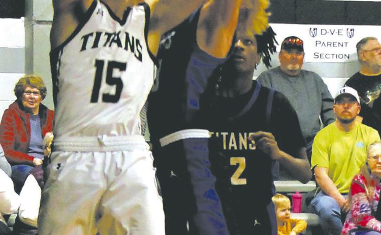 DVE’s Isaac Feltman recovers a rebound in Edinburg Feb. 8. Photo by Jamie Rarick