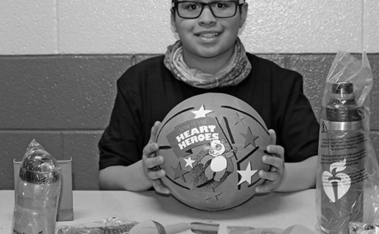Pictured above: Jerimiah Johnson with some of his thankyou gifts. Photo provided by Drayton Public School