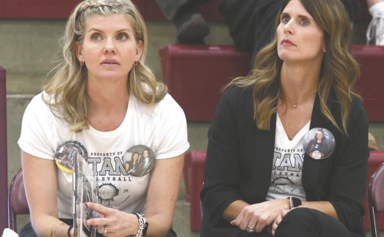 Coaches Fedje and Gullickson keep a close eye on the action. Photo by Lyle Van Camp