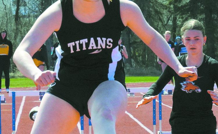 Ingrid Myrdal leaps over the hurdles with ease. Photo by Larry Stokke.