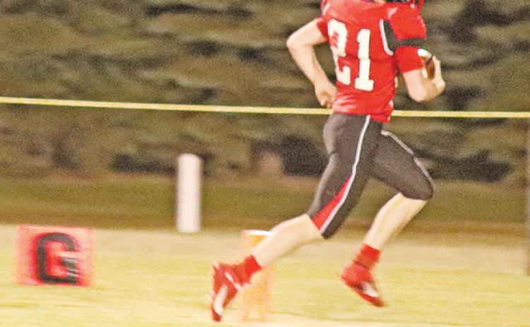 Cayden Quibell runs in the Bombers only touchdown late in the Homecoming game against Midway Minto last Friday night. VNV Photo by Lesa Van Camp