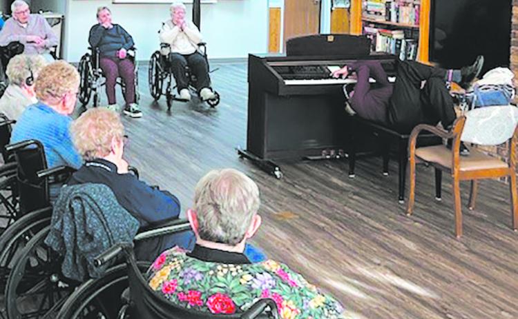 Gordy “Crazy Fingers” playing the piano while laying on his back!