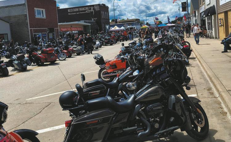 Motorcycles filled the street from the stoplight to the Cavalier Post Office. Photo by Julie Myrvik.