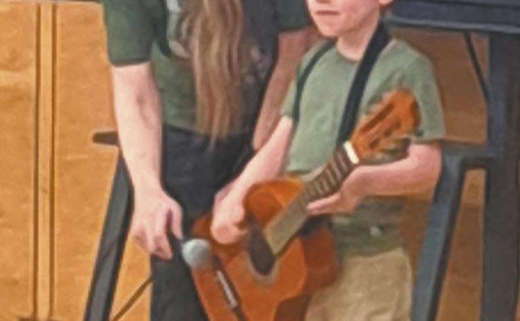 Mac Vold, son of Matt and Maggie Vold, was one of the young performers at the DPS talent show May 14. Photo by Christine Jensen