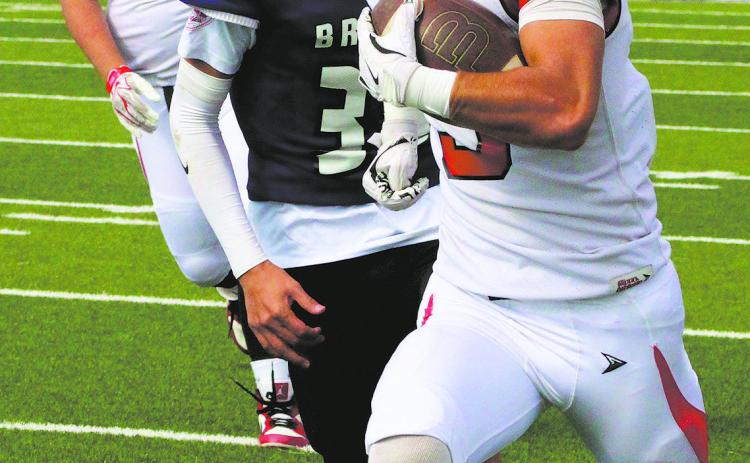 Bomber senior running back Trenten Keena outruns the Braves defense for a Bomber touchdown. Photo by Jamie Rarick