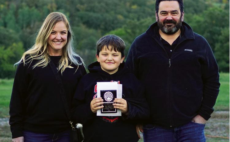 Chris, Cooper and Al Berry of Birchwood Chevrolet took home awards for best customer service and best auto or ag dealer in the region. Photo by Larry Stokke