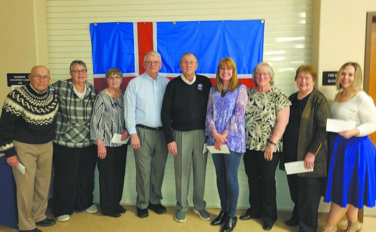 Representatives accepting Heritage Site grants: L-R John H. Johnson (Gardar Pioneer church), Michelle Murray (Svold Hall), Karen Kristjanson (Thingvalla Cemetery), Kayo Vivatson (Vidalin), Gerald Christianson (Borg Memorial Home), Sharon Laxdal (Gardar Lutheran), Karen Langerud (Gardar Township Hall), Barb Mahar (NENDHA for Akra Hall) and Dori Heck (Vikur LCW).