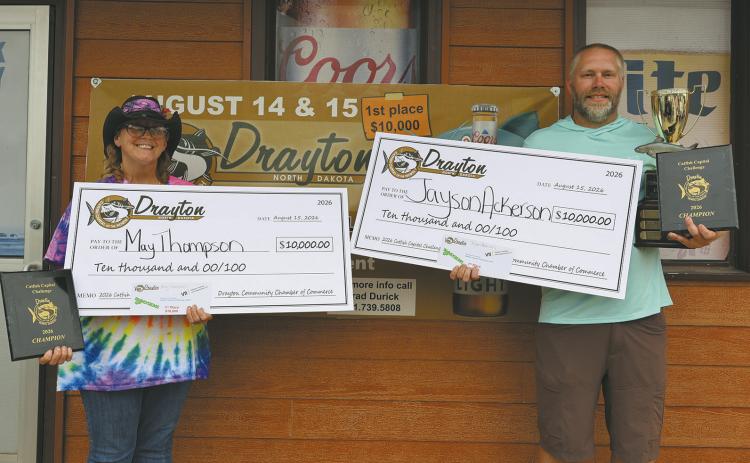 May Thompson of East Grand Forks and Jayson Ackerson of West Fargo were all smiles after reeling in first place at the 2026 Drayton Catfish Capital Tournament. The Team 3 partners finished with a two-day total of 76.68 pounds and took home $10,000. Photo by Rebecca Davis
