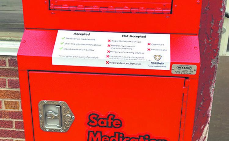The medication take back box is located in front of the former Hillier Tire building on Main Street. Photo by Andrea Johnston