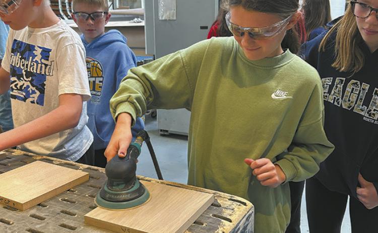 Students got an opportunity for hands-on experience at Woodside Industries. Submitted photo