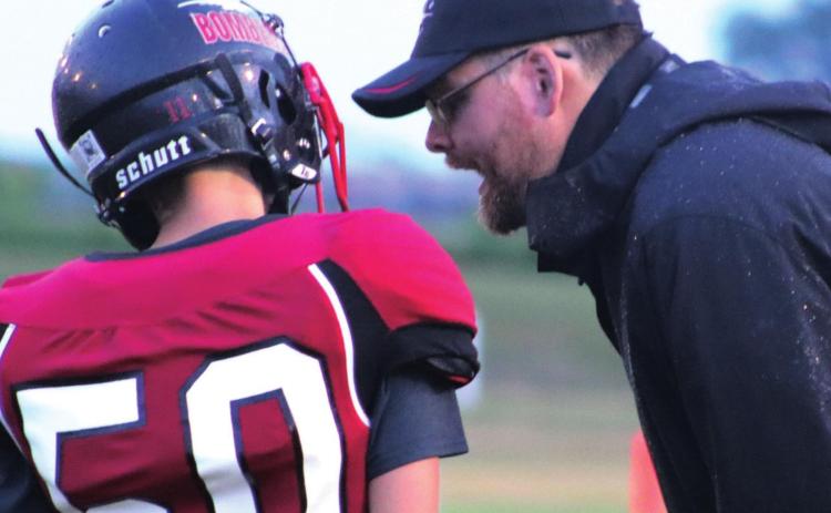 First year head coach Nathan Foster is telling quarterback Gavin Ryan that he did everything right even if the play did not work. VNV photo by Lyle Van Camp