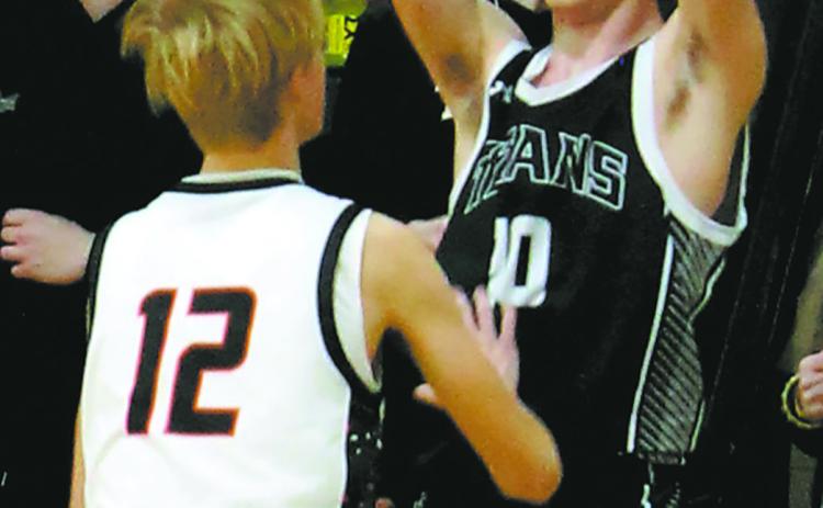 DVE Senior Brady Reilly looks for the open pass. Photo by Jamie Rarick