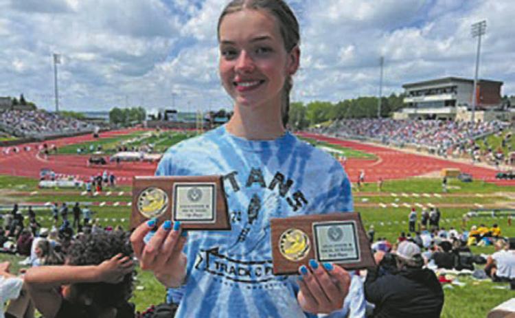 Elizabeth Fedji crushed the 24 year DPS standing record in the 400 dash. Photo by Jeryl Thompson