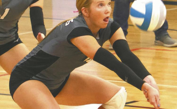 Easton Larson keeps on the ball as she receives a serve in action in Drayton on Tuesday evening of last week. Photo by Lyle Van Camp