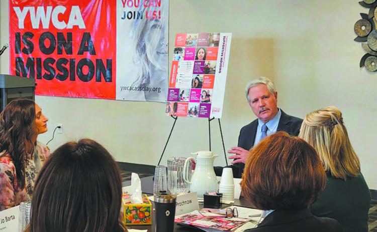 Sen. John Hoeven listens Feb. 20, 2026, as leaders from the YWCA in Fargo discuss helping the homeless. Photo by Jeff Beach/North Dakota Monitor