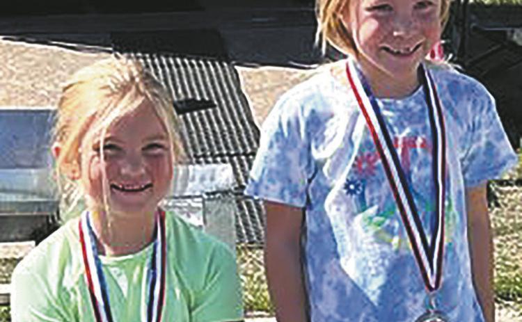 Lydia Moquist and Lakelyn Barten took first and second place in the seven year old division. Submitted photo
