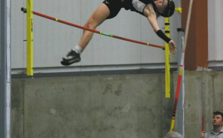 Clearing the bar, DVE junior Alyssa Hoyles finished 2nd for the day in Girls Pole Vault. Together with Minot North's McKinnley Kragh, a new meet record was set at 9' 9'. Photo by Jamie Rarick