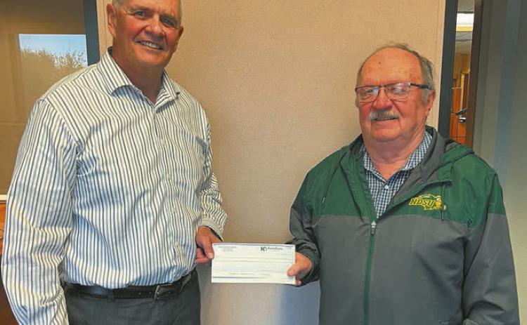 Pete Anderson, KodaBank left, with Andy Duncklee, Drayton Improvements, right. Submitted photo.