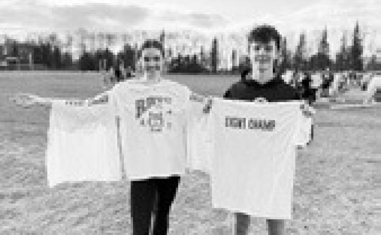 Elizabeth Fedje and Brady Reilly display their event winner’s tee-shirts. Photo submitted by Jeryl Thompson.