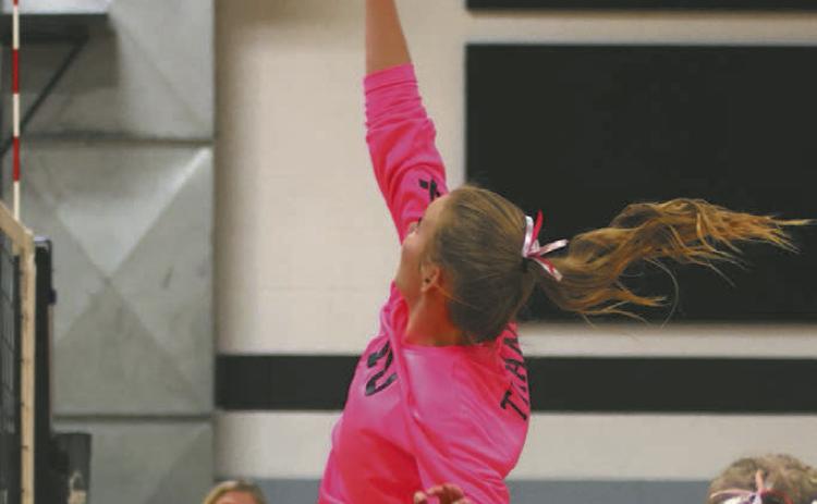 Easton Larson goes for a kill against the Wildcats in Edinburg on Tuesday of last week.