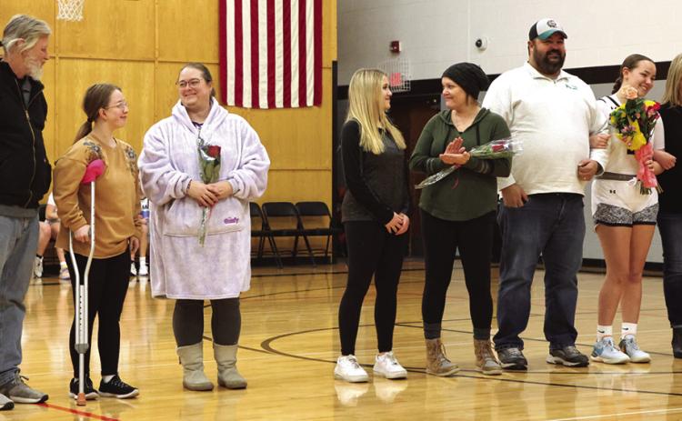 The Titan's celebrated Senior Night on Thursday evening of last week in the Drayton gym. Pictured from the left are; Stephen, Siobhan, and Lindsay Kissee; Claire and Kayla Thompson, Mike Berg, Hailey Berg, and Barb Sapa