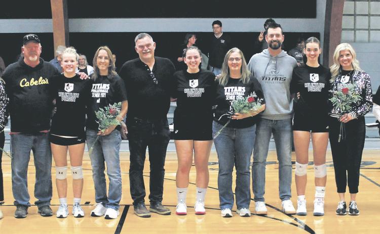 DVE seniors and their parents were recognized prior to Monday's game in Crystal. Pictured with their parents are seniors Brooke Gullickson, Alyssa Hoyles, Christine O'Toole, Elizabeth Fedje, and Raelyn Knutson. Photo by Jamie Rarick.