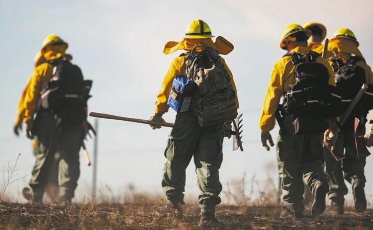 North Dakota National Guard soldiers and airmen work with the Department of Emergency Services to prevent the spread of a wildfire near Mandaree on Oct. 6, 2024. Gov. Kelly Armstrong declared a statewide fire emergency Aug. 7, 2026, due to drought conditions. (U.S. Army National Guard photo courtesy of Staff Sgt. Samuel J. Kroll)