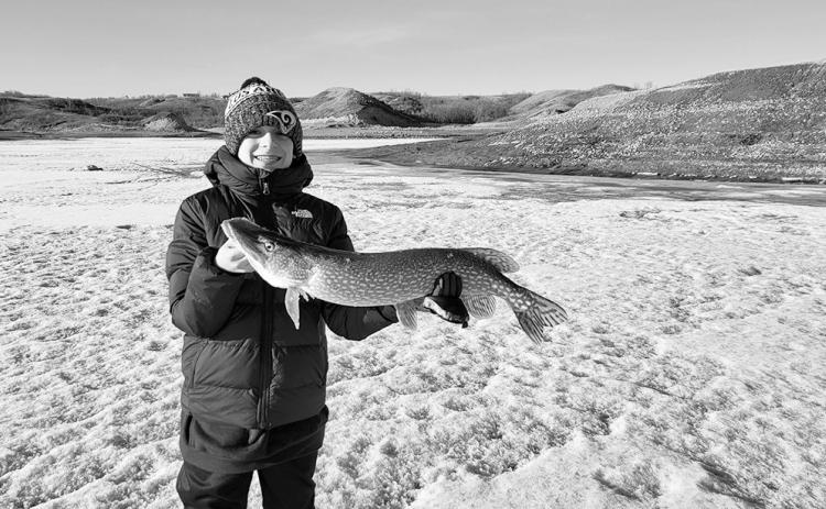14 year old Jack Ressler with a pike from Hazen Bay. Photo by NDGF Ashley Peterson.