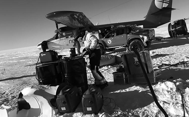 One of the team making repairs with a portable welder and taking on fuel delivered by a ski-equipped Dash 7 turboprop airplane. Photo contributed by Jon Solberg.