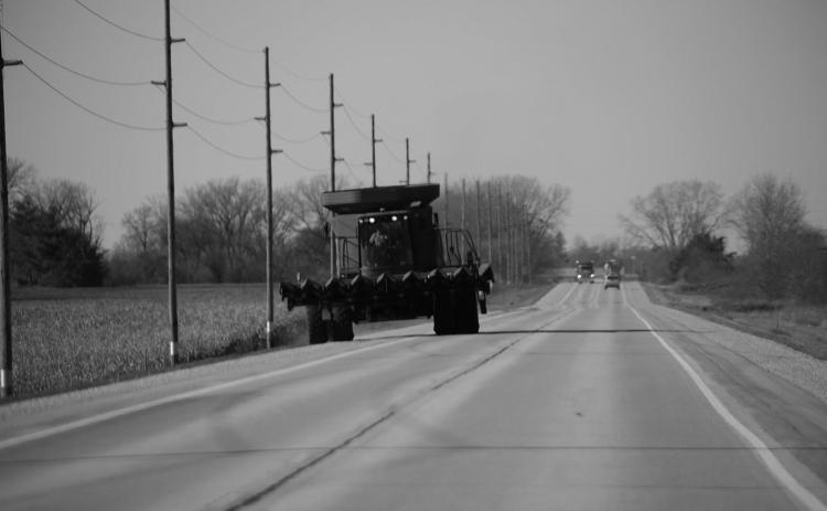 As agricultural producers prepare for harvest season, it is crucial for motorists and farm equipment operators to share the road to prevent roadway collisions. (Photo by Central States Center for Agricultural Safety and Health (CS-CASH))