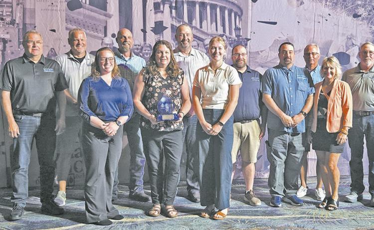 North Dakota Rural Water Systems Association (NDRWSA) is presented with the Outstanding Achievement in Member Services award by the National Rural Water Association. Submitted photo