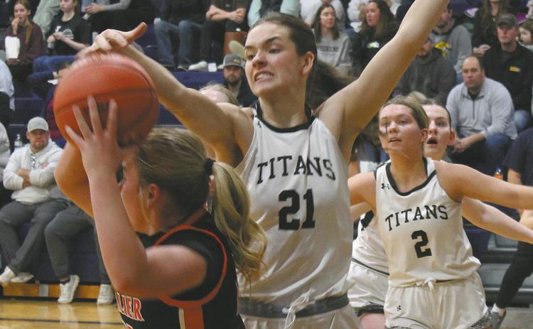 DVE senior Elizabeth Fedje fights for the ball. Photo by Jamie Rarick