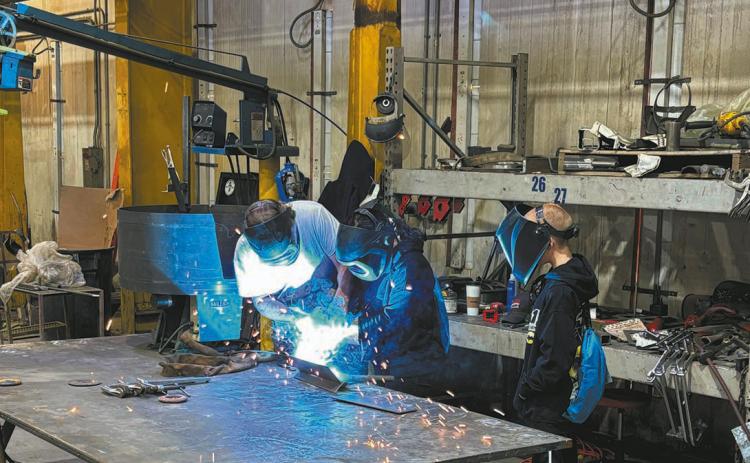 Students got to try their hand at welding at Kringstad Ironworks in Park River. Submitted photo