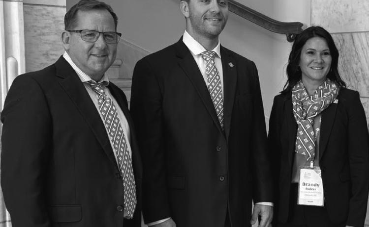 (left to right) Mark Jensen, chief executive officer, AgCountry Farm Credit Services; Brandon Strutzenberg, Starting Gate row crop producer; Brandy Balzer, Developing Markets Manager - Young &amp; Beginning, AgCountry Farm Credit Services, participate in the national Farm Credit Fly-In in Washington, D.C.