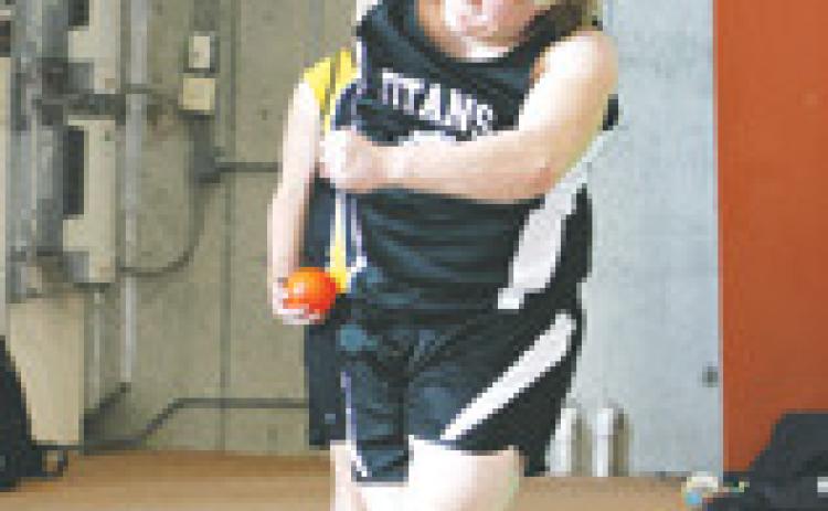Bryce Wimpheimer's second attempt at the shot put. Photo by Lyle Van Camp.