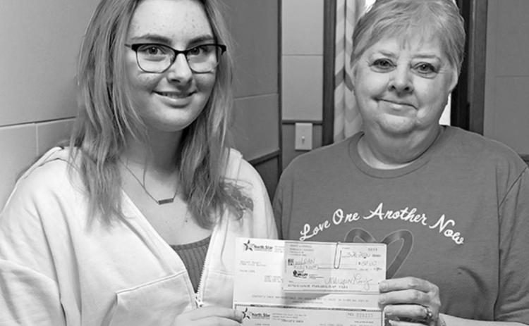 Pictured right to left: 4-H Jr. Leader Myah Jensen and L.O.A.N Board Member Lorna Ratchenski. Photo submitted