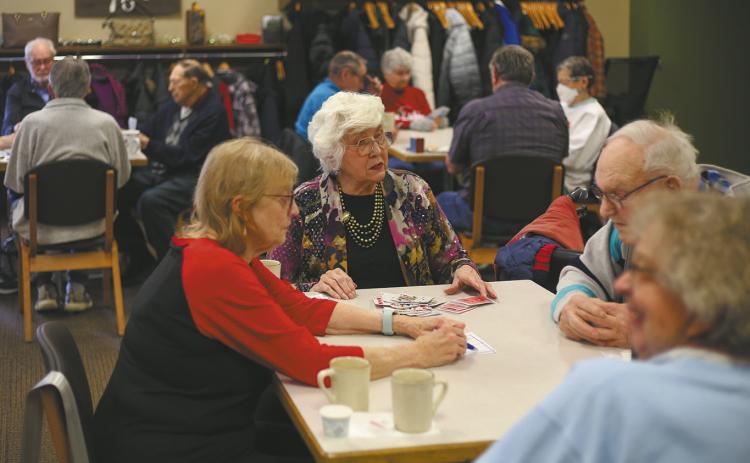 People gather at the Broadway Station Senior Center in Fargo on Wednesday, Dec. 10, 2025, for Pinochle Day. Chris Flynn / The Forum