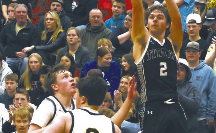 DVE's Teddy Otto goes for three during Tuesday night's game against Park River. Photo by Jamie Rarick