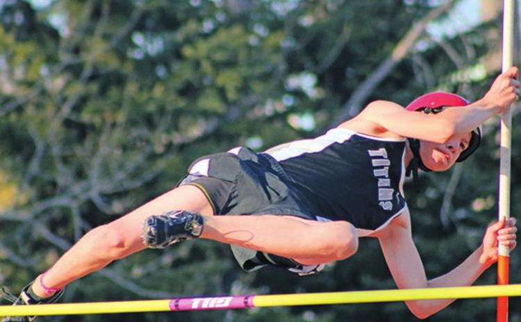 Gavin Ryan soars over the bar in the pole vault. Photo submitted by Drayton Public School
