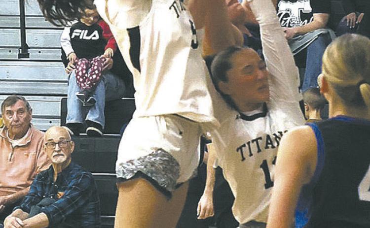 Fighting for the rebound on her home court Jan. 8, DVE's Gianna Hall comes out on top. Photo by Jamie Rarick