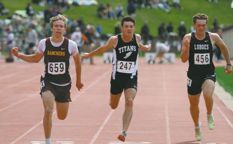 Brady Reilly, center, competes in the Boys' Class B 100 Meter Dash Preliminaries Friday. Reilly finished 13th overall in the preliminaries with a time of :11.38. Photo by Mike Alen Steinfeldt