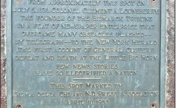 A monument dedicated in 1953 marks the approximate spot of the telegraph office from which the first news report of the Battle of the Little Bighorn was transmitted, in 1876. The monument sits along the east side fence of what was once the Bismarck train depot. Photo by Cecile Wehrman