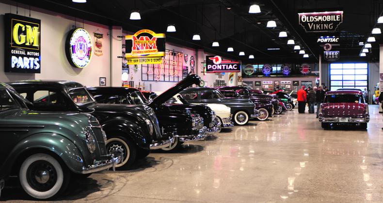 Some of the dozens of immaculately restored classic cars on display at the Rydell Toy Shop in the former K-Mart building in Grand Forks. Photo by Lyle Van Camp.
